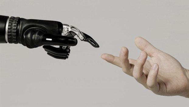 robot hand reaching out to human hand
